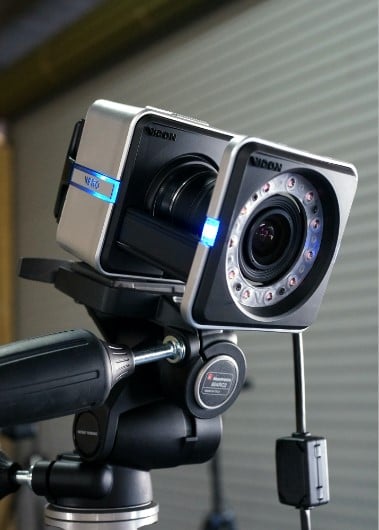 A stylish camera set up on tripod