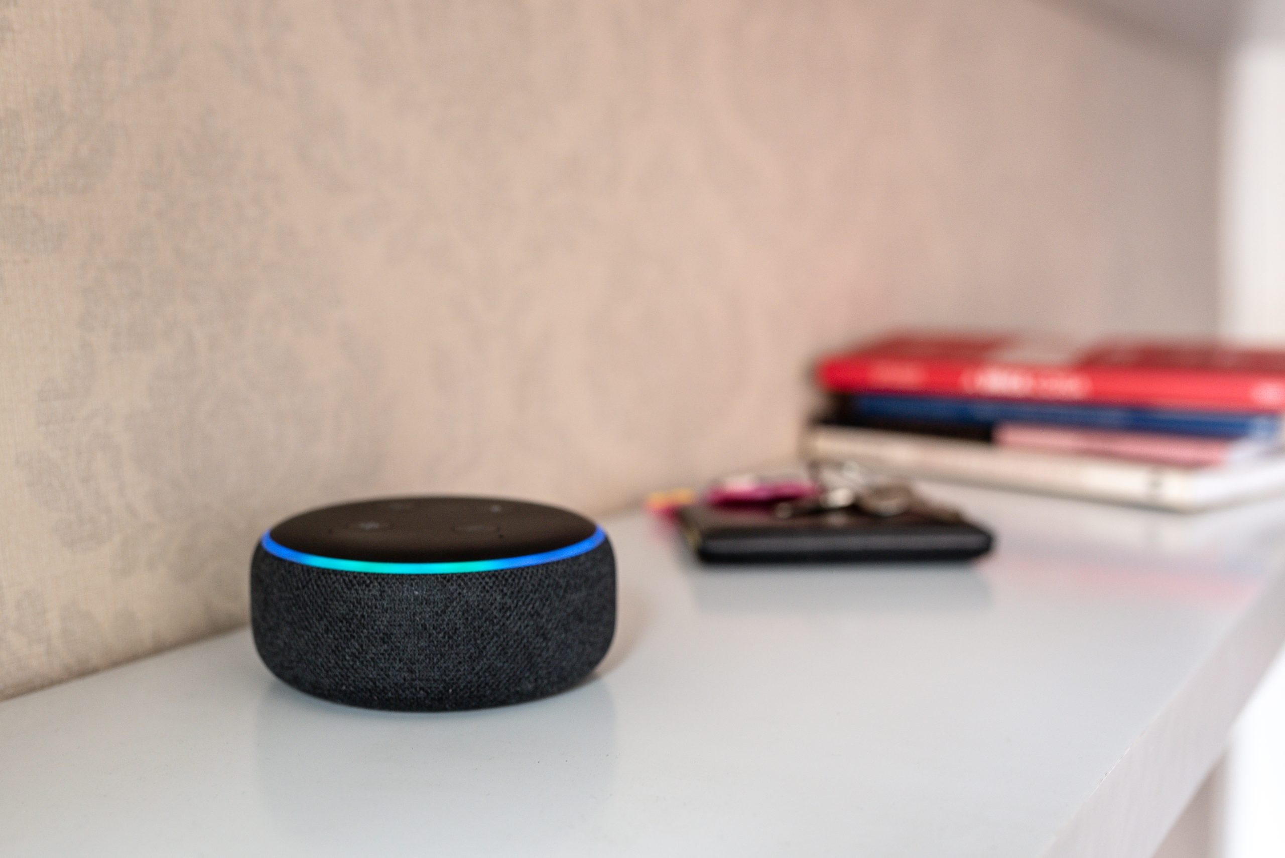 Smart speaker with integrated voice assistant on a kitchen worktop